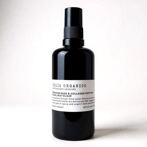 Black bottle with a label on a white background
